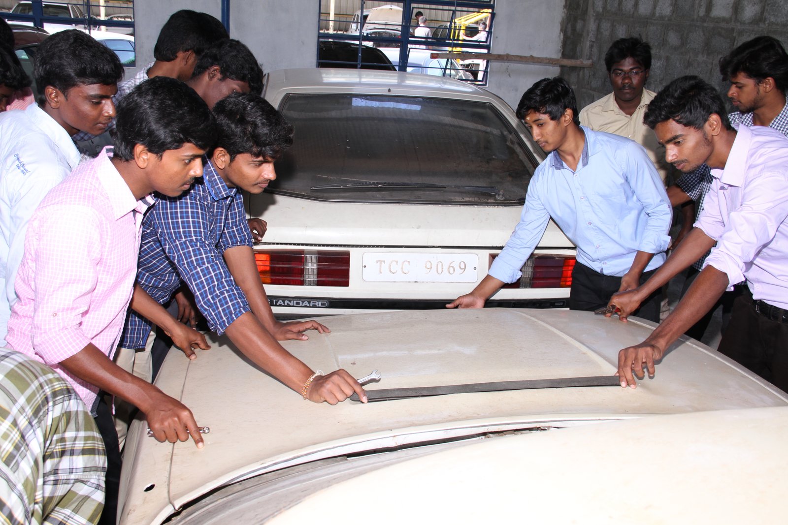 Car polishing process - bright orange car